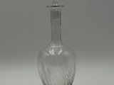 clear glass decanter with a glass stopper on the top