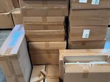 many boxes stacked on a pallet in a warehouse