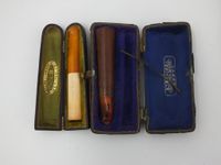 Réunion d'objets de fumeur comprenant une pipe, des briquets… (photo 4)