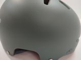 a helmet on a white surface with a white background