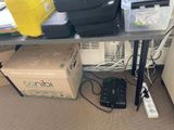 a table with a bunch of electronics on it