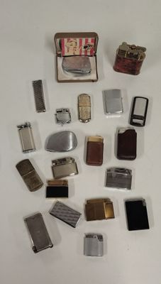 a lot of different types of electronic devices on the table