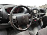 dashboard of a car with a steering wheel and dashboard controls