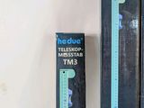 two boxes of telephones that are sitting on a table