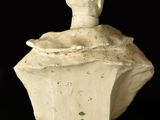 marble bust of a man with a hat on his head