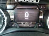 the dashboard of a car with a digital display showing the speed of the car