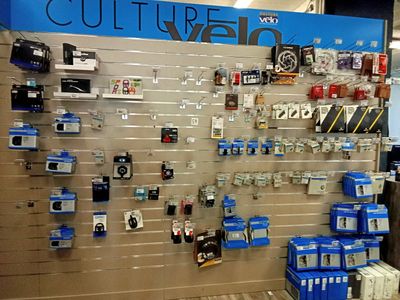 a display of cell phones on the wall in a store