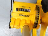 a close up of a yellow clock on a yellow bike