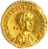 une pièce d'or portant l'image d'un homme