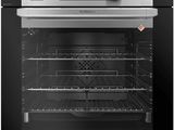 an image of a stainless steel oven with the door open