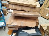 a pile of boxes sitting on top of each other in a warehouse
