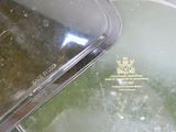 a close up of a metal object with a label on it