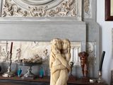 a statue that is sitting on top of a table