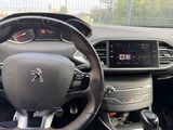 the interior of a car with a steering wheel and dashboard controls