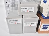 several boxes are stacked on top of each other on a table