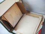 a box with a book inside of it on a table
