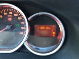 a close up of a speedometer on a car ' s dashboard