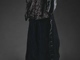 an image of a black dress and jacket on a mannequin mannequin