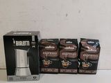 several boxes of coffee are lined up on a table