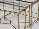 pair of brass and glass nesting tables
