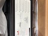 a box that has a printer in it and a box that has a printer inside of it