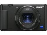 a black camera with a lens on a white background