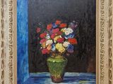an oil painting of a vase of flowers on a blue table