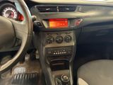 a dashboard of a car with a clock on it