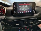 the dashboard of a car with a digital display in the center