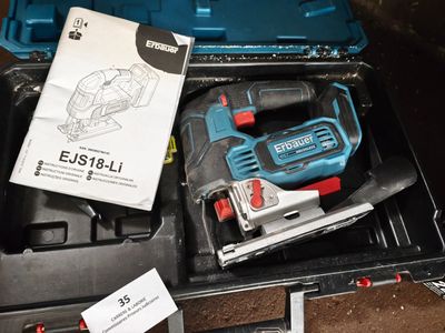 a box with tools in it on the floor