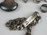 a lot of silver items that are on a table