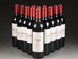 six bottles of red wine are lined up in a row