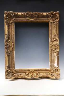 a picture of a gold picture frame on a table