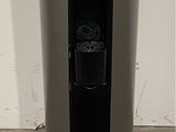 an image of a black and silver trash can