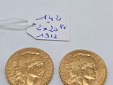 two gold coins with a price tag and a price tag