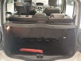 the back of a car with the trunk open and the seats down