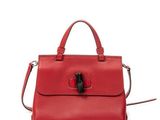 a red handbag on a white background