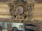 a person taking a picture of themselves in a mirror
