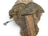 a piece of wood with a metal handle attached to it