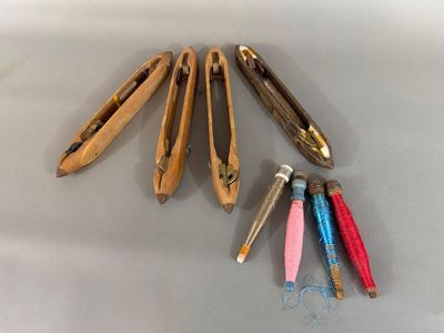 five pairs of scissors that are sitting on a table