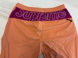 Short Supreme orange et violet