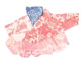 a pile of pink and blue napkins on a white surface