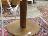 a table with a clock on top of it in a room