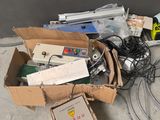 a box full of electronic equipment sitting on the floor