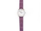 a close up of a wrist watch on a white background