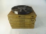 une pile de vieilles bobines de film empilées les unes sur les autres