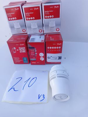 several boxes of toilet paper and a roll of toilet paper on a table