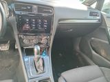 the interior of a car with a steering control and dashboard controls