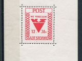 le timbre est rouge et blanc et comporte un triangle