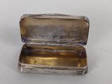a silver box that is sitting on a table